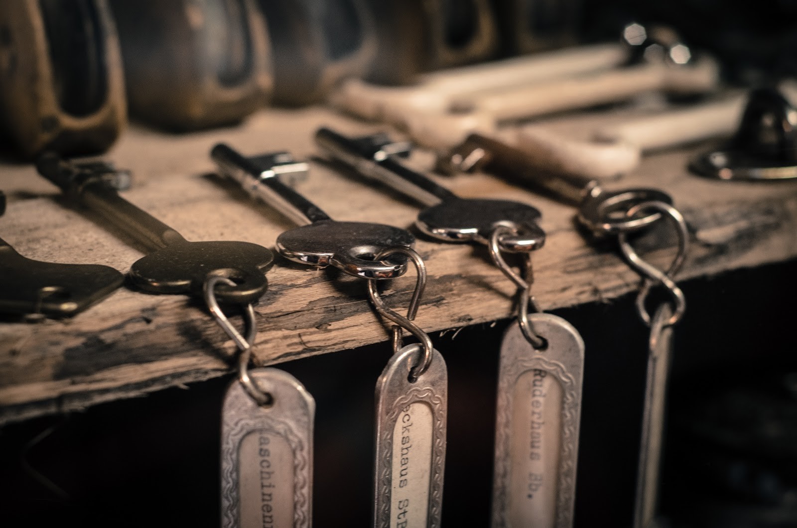 keys hanging on a wood piece